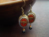 Tibetan Coral Compassion Eyes Earrings