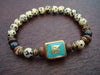 Tibetan Turquoise Protection & Willpower Om Mala Bracelet